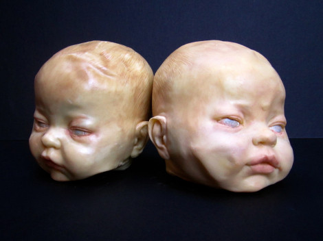 creepy white chocolate baby heads