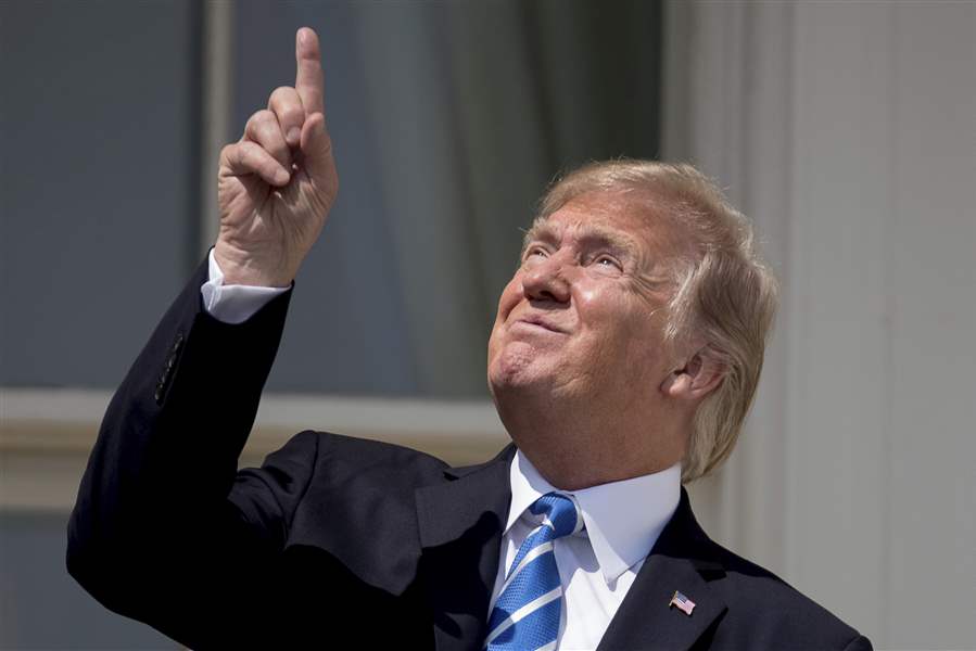 Trump Looked At The Eclipse