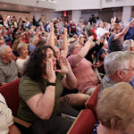 Great pic of MAGA loons getting booed. REUTERS/Scott Morgan